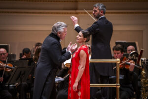 Christmas Night Opera with Francesco Lanzillota conducting the American Symphony Orchestra with Anita Monserrat, Asmik Grigorian, Brian Jagde, Nadine Sierra, Sondra Radvanovsky, Thomas Hampson performing at Carnegie Hall. Photo: Chris Lee