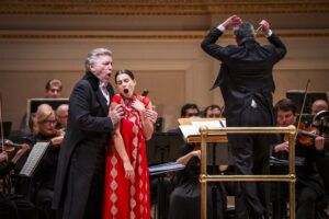 Christmas Night Opera with Francesco Lanzillota conducting the American Symphony Orchestra with Anita Monserrat, Asmik Grigorian, Brian Jagde, Nadine Sierra, Sondra Radvanovsky, Thomas Hampson performing at Carnegie Hall. Photo: Chris Lee